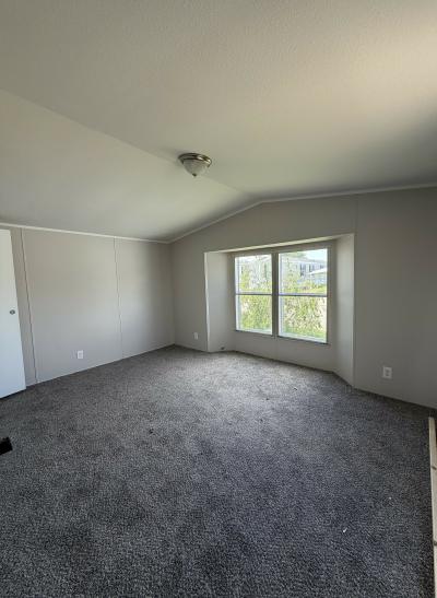Photo 3 of 4 of home located at 869 Pinecreek Dr Site 153 Middleville, MI 49333