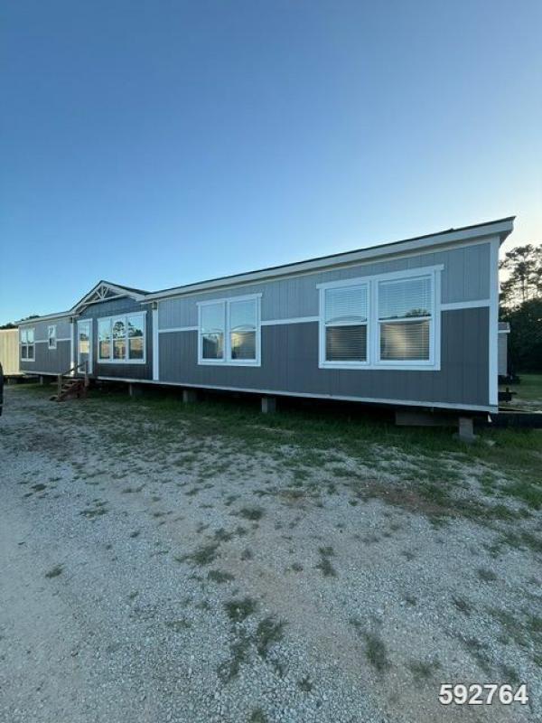 Photo 1 of 2 of home located at Greater Texas Home Buyers Llc 7770 Us Hwy 59 Goodrich, TX 77335