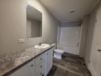 Photo 5 of 8 of home located at 702 Thomas J Drive Flint, MI 48506