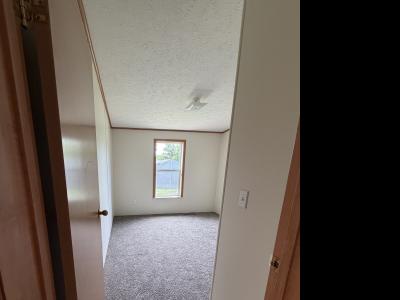 Photo 2 of 14 of home located at 890 Riverbend Lane Site 036 Middleville, MI 49333