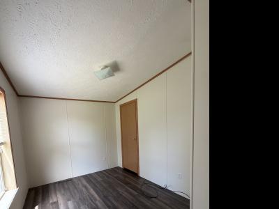 Photo 3 of 14 of home located at 890 Riverbend Lane Site 036 Middleville, MI 49333