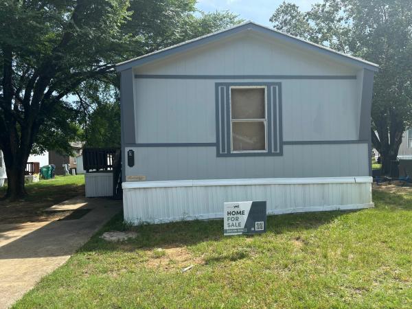 Photo 1 of 2 of home located at 9100 Teasley Lane, #16E Lot E16 Denton, TX 76210