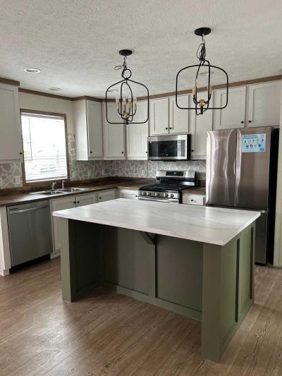 Photo 2 of 3 of home located at 6564 E. Michigan Ave. Lot 148 Saline, MI 48176