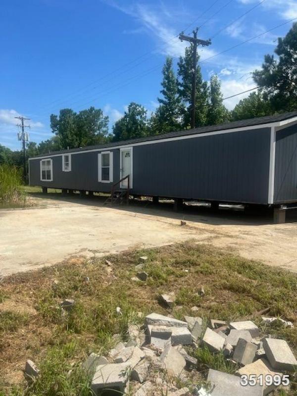 Photo 1 of 2 of home located at Milford Enterprise Inc. 8652 Us Highway 96 N Brookeland, TX 75931