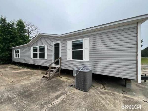 Photo 1 of 2 of home located at Milford Enterprise Inc. 8652 Us Highway 96 N Brookeland, TX 75931