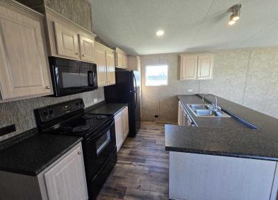 Mobile Home at 1001 E Macarthur Rd, Lot 33 Kansas City, KS 67216