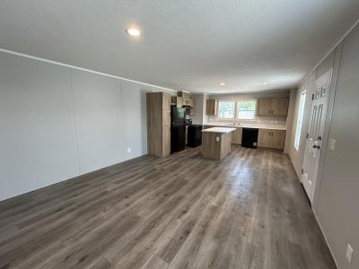 Photo 2 of 9 of home located at 32 Camelot Lane, Site #  112 Rice Lake, WI 54868