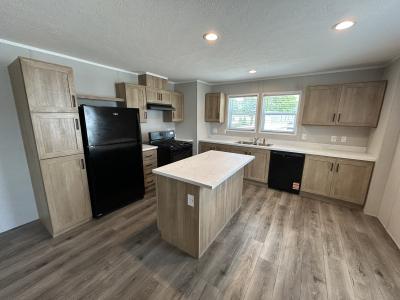 Photo 3 of 9 of home located at 32 Camelot Lane, Site #  112 Rice Lake, WI 54868