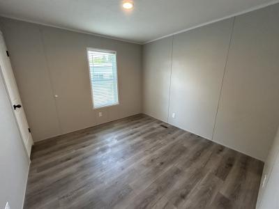Photo 5 of 9 of home located at 32 Camelot Lane, Site #  112 Rice Lake, WI 54868