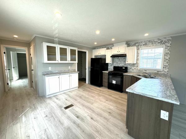 Photo 1 of 2 of home located at 45549 Chateau Thierry Dr., Site #82 Macomb, MI 48044