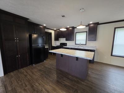 Photo 3 of 9 of home located at 903 Thomas J Drive Flint, MI 48506