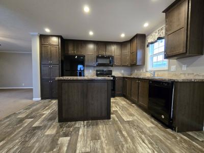 Photo 1 of 12 of home located at 7204 East Grand River Ave Lot 386 Portland, MI 48875