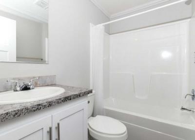 Photo 5 of 7 of home located at 1001 E Macarthur Rd, Lot 163 Wichita, KS 67216