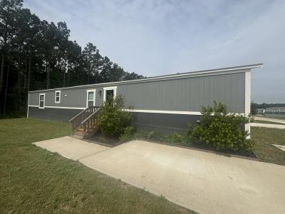 Photo 3 of 13 of home located at 10046 S Xavier St Conroe, TX 77303