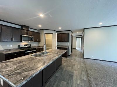 Photo 2 of 11 of home located at 2319 S Dundee Ct Highland, MI 48357
