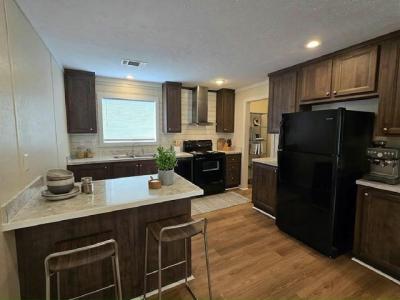 Photo 2 of 6 of home located at 13618 N. Florida Avenue Lot #26 Tampa, FL 33613