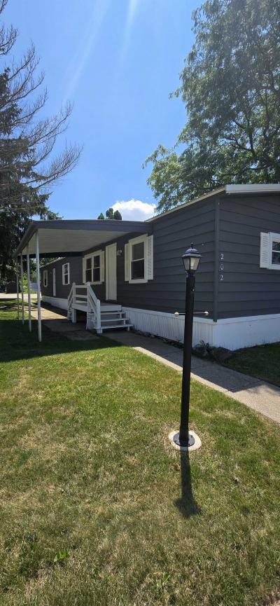 Photo 2 of 16 of home located at 202 Brittany Dr Lansing, MI 48906