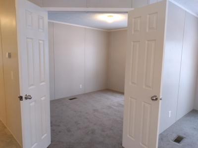 Photo 5 of 8 of home located at 2629 W Tartan Ct Highland, MI 48357