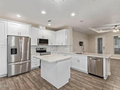 Photo 3 of 15 of home located at 3301 S Goldfield Road Lot 6039 Apache Junction, AZ 85119