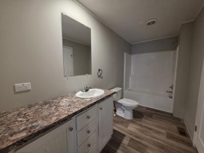 Photo 5 of 9 of home located at 408 Jack Pine Circle Flint, MI 48506