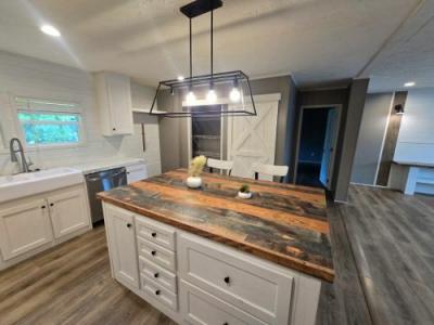 Photo 4 of 15 of home located at 8800 State Route 100 Jacks Creek, TN 38347