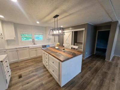 Photo 5 of 15 of home located at 8800 State Route 100 Jacks Creek, TN 38347