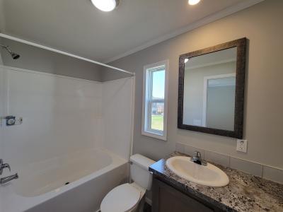 Photo 5 of 6 of home located at 216 E Glengarry Ct Highland, MI 48357