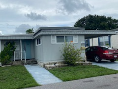 Photo 2 of 51 of home located at 7100 Ulmerton Road Lot 1056 Largo, FL 33771
