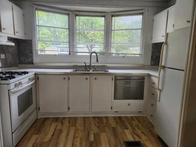 Photo 3 of 6 of home located at 108 Lancelot  Pl, #29 Lansing, MI 48906