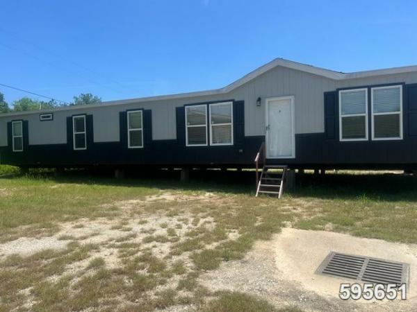 Photo 1 of 2 of home located at Milford Enterprise Inc. 8652 Us Highway 96 N Brookeland, TX 75931