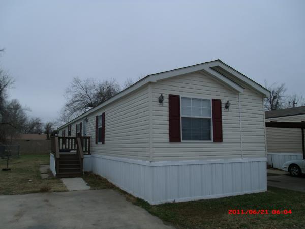 Photo 1 of 2 of home located at 8808 Windy Hollow Drive Lot 59 Midwest City, OK 73110