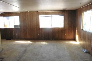 Large front living room with many windows