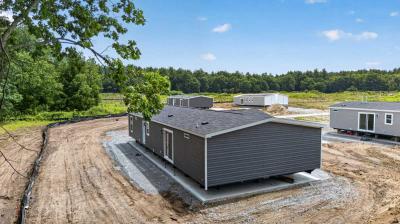 Photo 2 of 8 of home located at 13 Charles Bancroft Hwy Litchfield, NH 03052