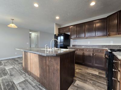 Photo 2 of 12 of home located at 7204 East Grand River Ave Lot 266 Portland, MI 48875