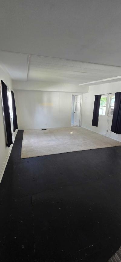 Photo 3 of 11 of home located at 302 Brittany Dr. #210 Lansing, MI 48906