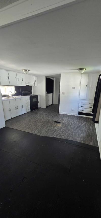 Photo 5 of 11 of home located at 302 Brittany Dr. #210 Lansing, MI 48906