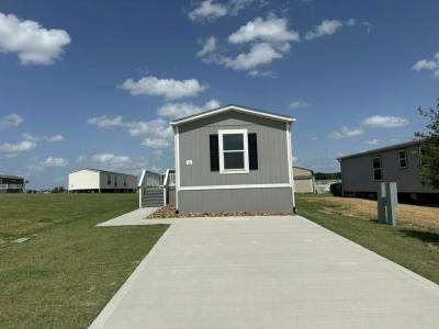 Photo 2 of 11 of home located at 16 Open Range Trail Willis, TX 77318