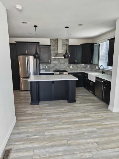 Photo 4 of 27 of home located at 17261 Gothard Street #13 Huntington Beach, CA 92647