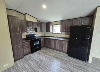 Photo 2 of 8 of home located at 1001 E Macarthur Rd, Lot 6 Wichita, KS 67216