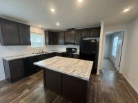 2024 Champion Home Builders, Inc. Highland Manufactured Home