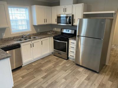 Photo 2 of 21 of home located at 15557 Pine Ridge Drive #24 Linden, MI 48451