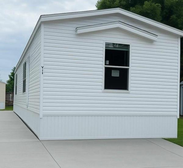 Photo 1 of 2 of home located at 3101 River Rd., Lot #60 Sodus, MI 49126
