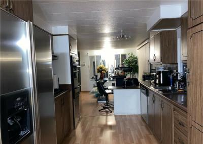 Photo 3 of 19 of home located at 8811 Canoga Avenue Canoga Park, CA 91304