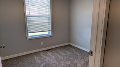 Photo 5 of 7 of home located at 225 E Glengarry Ct Highland, MI 48357