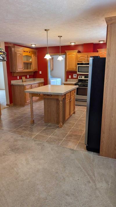 Photo 3 of 19 of home located at 8291 Thetford Lane Willis, MI 48191