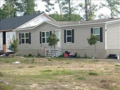 Mobile Home at 2311 Road 5838 Cleveland, TX 77327