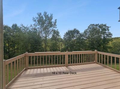 Photo 3 of 36 of home located at 1243 Nottingham Drive Northville, MI 48167