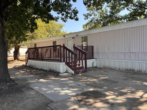 Photo 1 of 2 of home located at 1240 N COWN #117 Lewisville, TX 75057