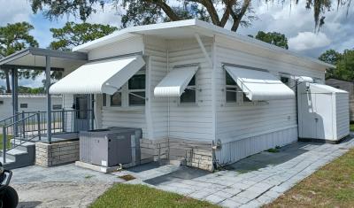 Photo 3 of 13 of home located at 37647 Chancey Road, Site 216 Zephyrhills, FL 33541