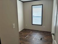 2023 166032A  Home